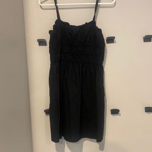 Really cute black wide strap tank top dress from Target. Has cute ruffle top.
